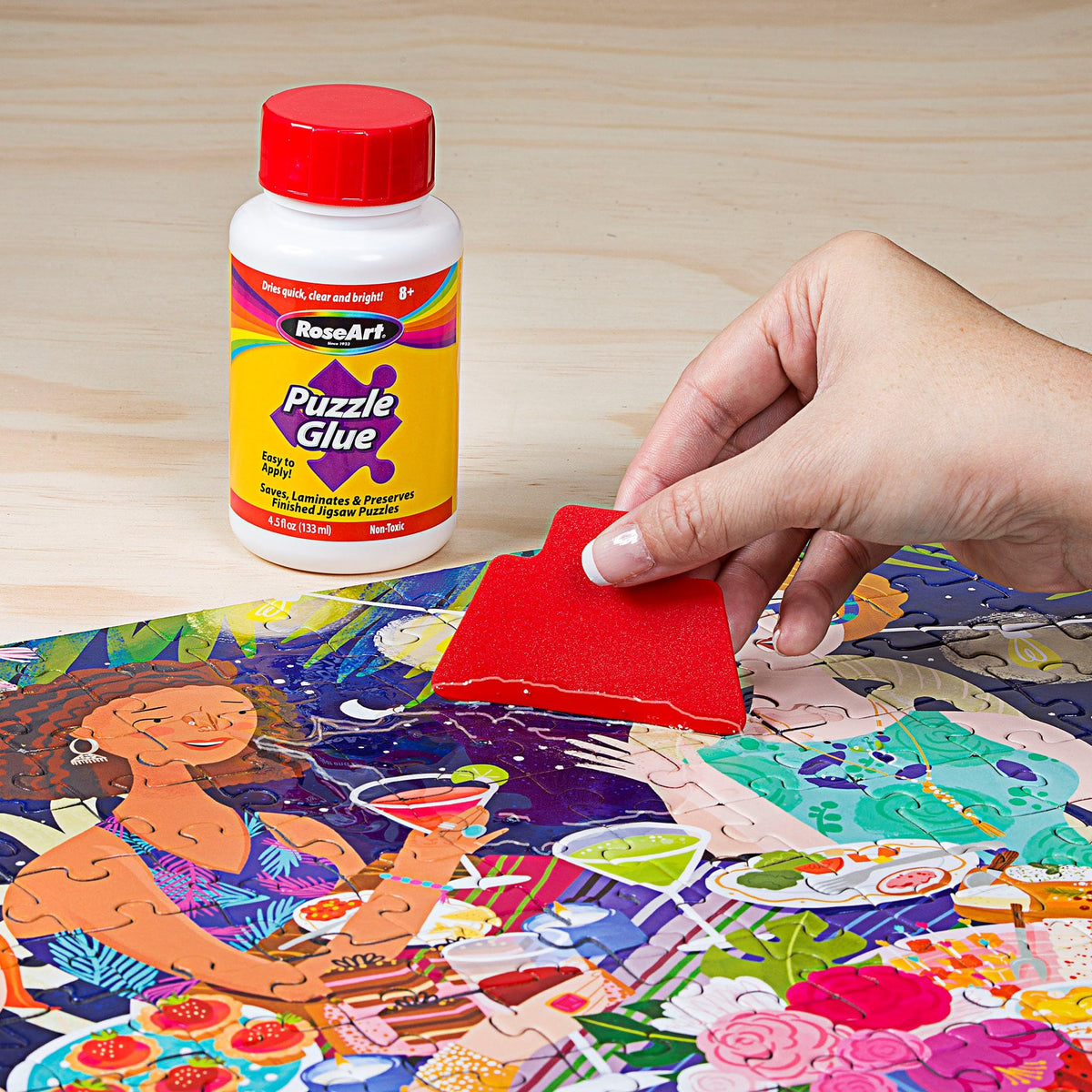 RoseArt Jigsaw Puzzle Glue with Applicator - Saves, Laminates and Preserves Finished Jigsaw Puzzles - Easy to Apply, Dries Quick, Clear & Bright